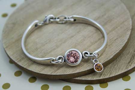 Media pulsera de zamak con entrepieza swarovski SS39 y colgante SS24