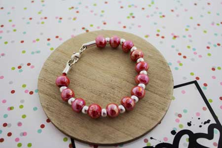 pulsera-bolas-rojas-la-fermina-abalorios-zamak-plata-bisuteria-grabados-personalizados